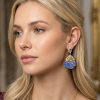 rock opal earrings on model